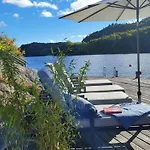 Seaside With Terrace And Jetty In *