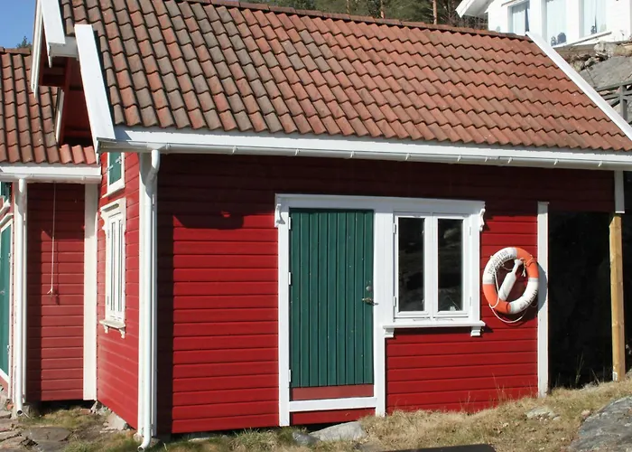 Seaside With Terrace And Jetty In Søgne